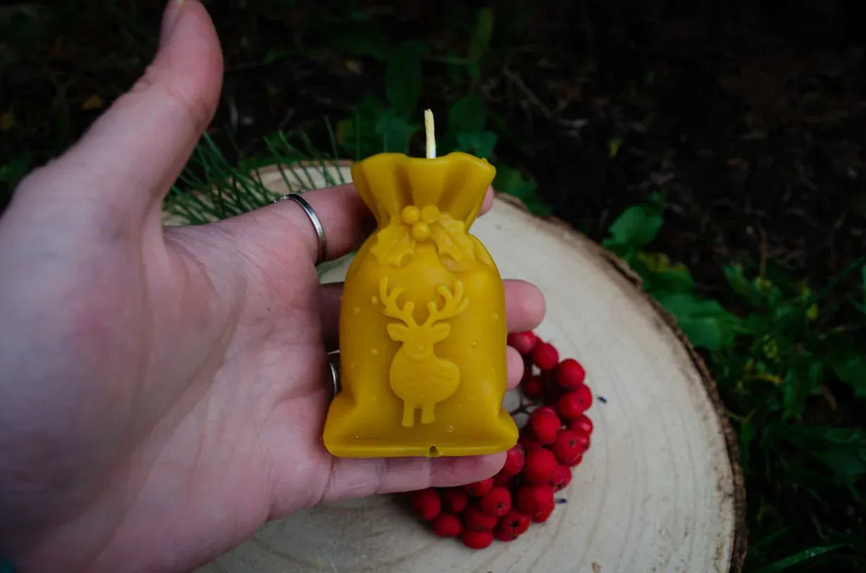 Bičių vaško žvakė "Kalėdų krepšys" - Melora