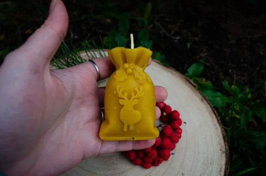 Bičių vaško žvakė "Kalėdų krepšys" - Melora